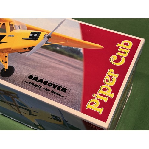 68 - Radio Controlled model aircraft, an Oracover Piper Cub kit, boxed, 103cm x 32 cm x 25 cm.

This lot ... 