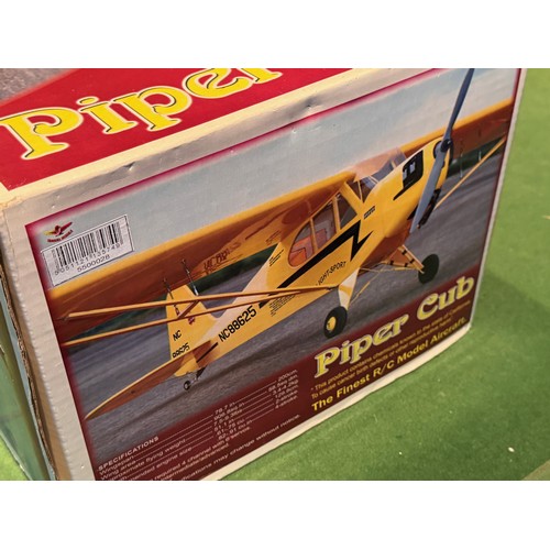 68 - Radio Controlled model aircraft, an Oracover Piper Cub kit, boxed, 103cm x 32 cm x 25 cm.

This lot ... 