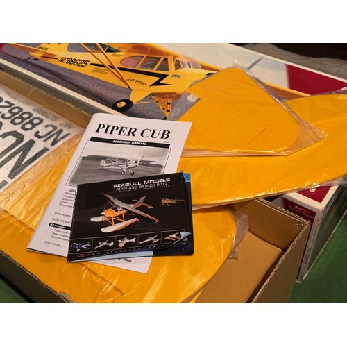 68 - Radio Controlled model aircraft, an Oracover Piper Cub kit, boxed, 103cm x 32 cm x 25 cm.

This lot ... 