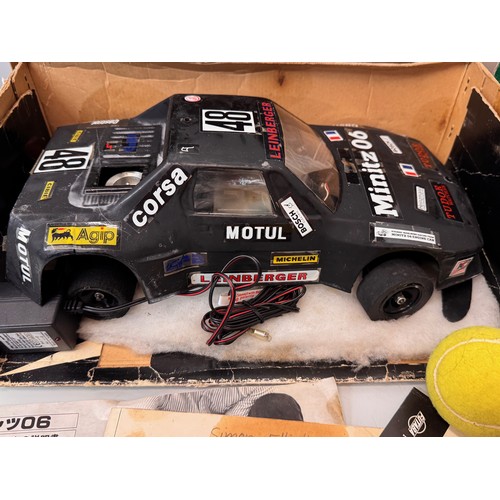 69 - Radio control model toys, RC Fiat X19 Rally car, boxed and two controllers.

This lot is available f... 