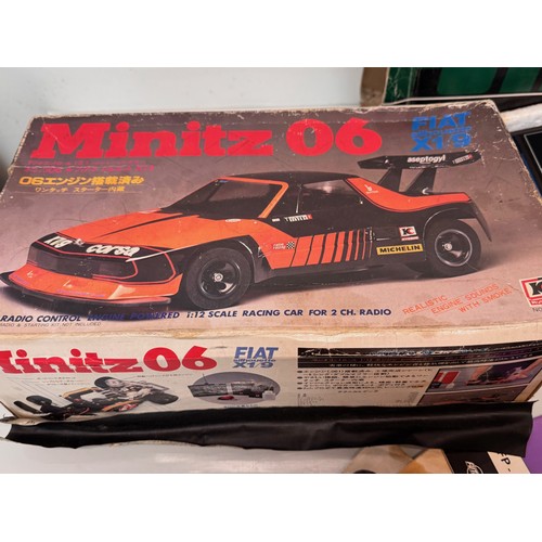 69 - Radio control model toys, RC Fiat X19 Rally car, boxed and two controllers.

This lot is available f... 