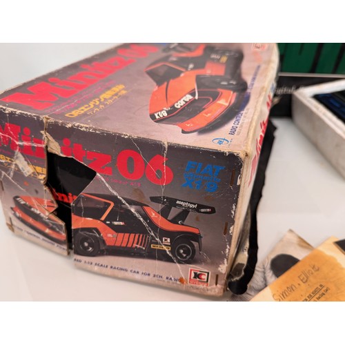 69 - Radio control model toys, RC Fiat X19 Rally car, boxed and two controllers.

This lot is available f... 