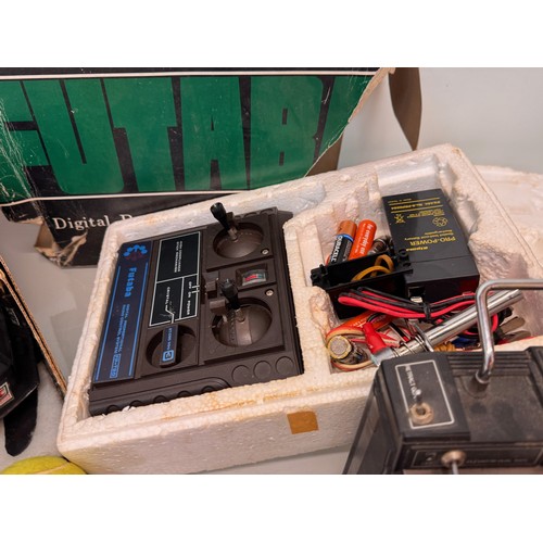 69 - Radio control model toys, RC Fiat X19 Rally car, boxed and two controllers.

This lot is available f... 