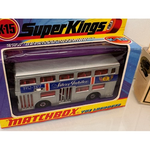 76 - Diecast toy busses, four boxed examples. Matchbox and Corgi.

This lot is available for in-house shi... 