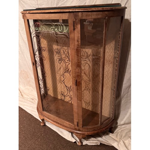 166 - Art Deco furniture, bow fronted glass display cabinet with two glass shelves, shown on top of the un... 