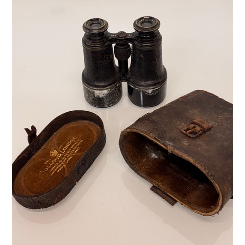 316 - Early C20th century field glasses by Dolland of London.

This lot is available for in-house shipping