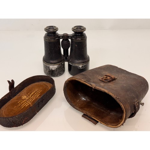 316 - Early C20th century field glasses by Dolland of London.

This lot is available for in-house shipping