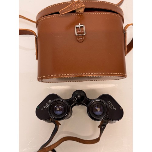 317 - Mid C20th Dolland of London field glasses with a leather case.

This lot is available for in-house s... 