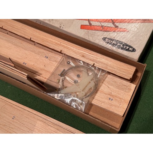 324 - Balsa wood model aircraft, Combat Kittens kits boxed. 54.5 cm x 11 cm x 3.5 cm.

This lot is availab... 