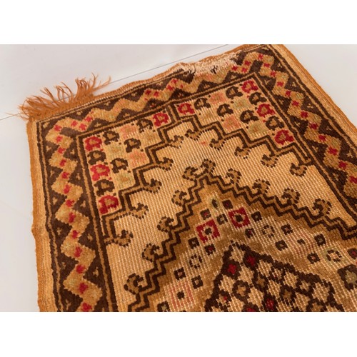 340 - Furnishings, a woven wool floor rug, 110 cm x 61 cm.

This lot is available for in-house shipping