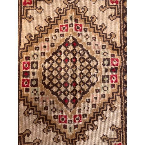 340 - Furnishings, a woven wool floor rug, 110 cm x 61 cm.

This lot is available for in-house shipping