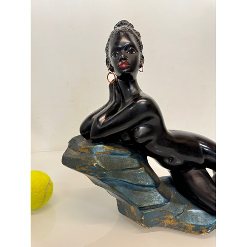 106 - Kitch painted chalk figure of a reclining female marked J.P. – M.D. 45 cm long.

This lot is availab... 