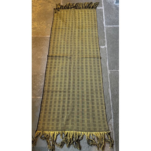 111 - African woven textile panel, 150cm x 57.5 cm.

This lot is available for in-house shipping