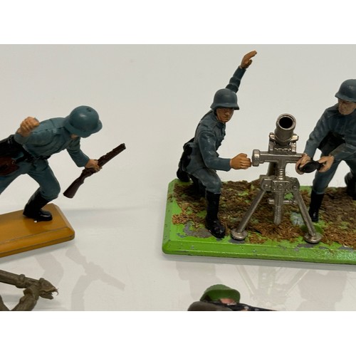 309 - Toys, Plastic and metal military figures etc, a mixed collection of military and other toy figures, ... 