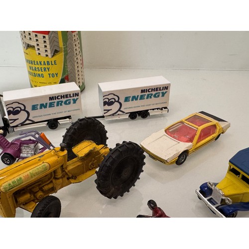 294 - Diecast toys Budgie, Corgi, Dinky, Matchbox,  also a Merit construction toy and cast lead motorcycle... 