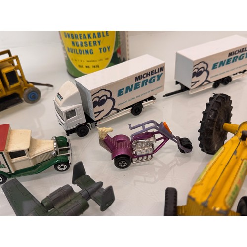 294 - Diecast toys Budgie, Corgi, Dinky, Matchbox,  also a Merit construction toy and cast lead motorcycle... 