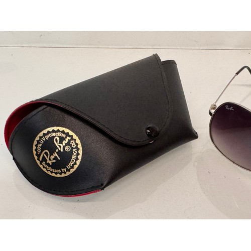 344 - Vintage Wayfarer Sunglasses, two pairs of cased Ray Bans and a pair marked with the Ferrari motor ca... 