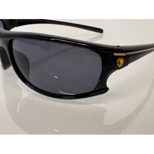 344 - Vintage Wayfarer Sunglasses, two pairs of cased Ray Bans and a pair marked with the Ferrari motor ca... 