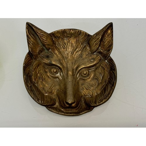 144 - Cast brass tray in the form of a foxes head, 13 cm x 12 cm.

This lot is available for in-house ship... 