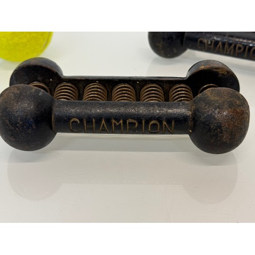 363 - Vintage body building and sports equipment, a pair of Champion brand cast iron weighted resistance s... 