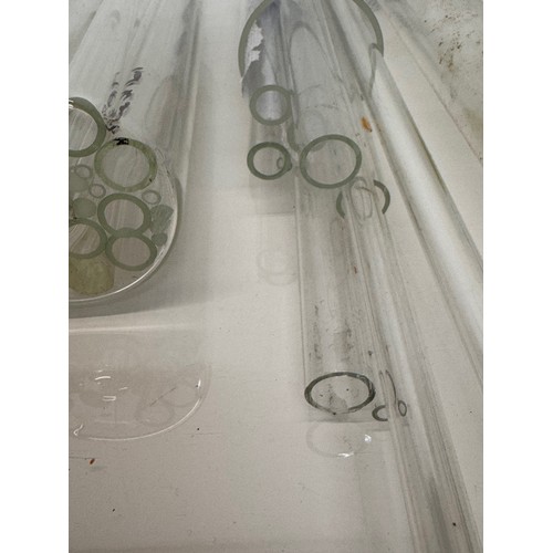 370 - Scientific glass manufacturing stock, various clear glass circular bar and tube sections.

This lot ... 