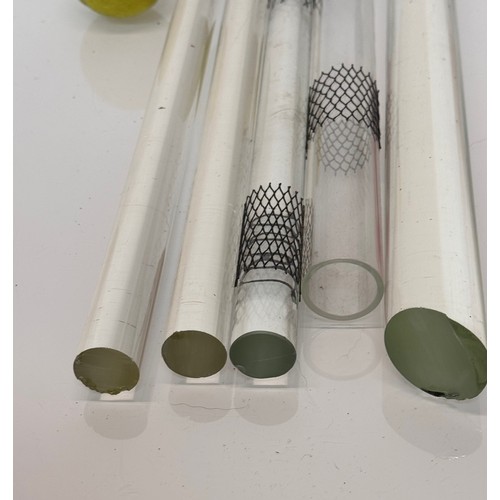 372 - Scientific glass manufacturing stock, various clear glass circular bar and tube sections.

This lot ... 