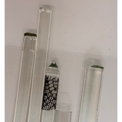 372 - Scientific glass manufacturing stock, various clear glass circular bar and tube sections.

This lot ... 