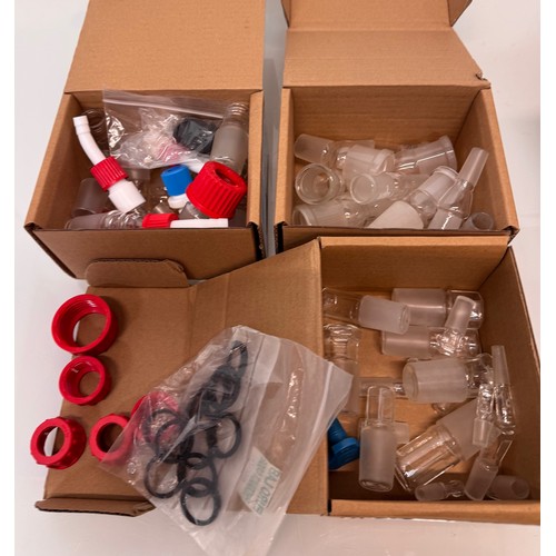 375 - Scientific workshop / laboratory fittings, Glass ware adaptors and stoppers in three boxes.

This lo... 