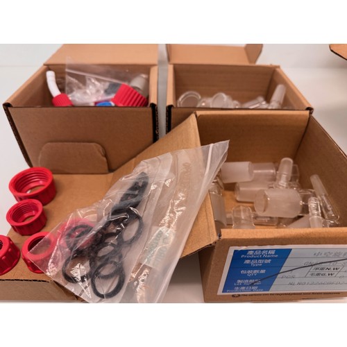 375 - Scientific workshop / laboratory fittings, Glass ware adaptors and stoppers in three boxes.

This lo... 