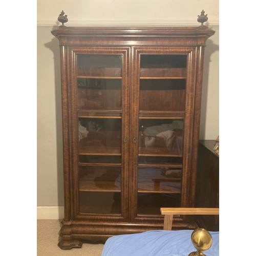 217 - Victorian furniture, a two door five section mahogany bookcase with glazed doors, one panel missing,... 