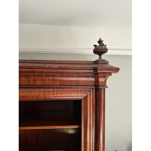 217 - Victorian furniture, a two door five section mahogany bookcase with glazed doors, one panel missing,... 