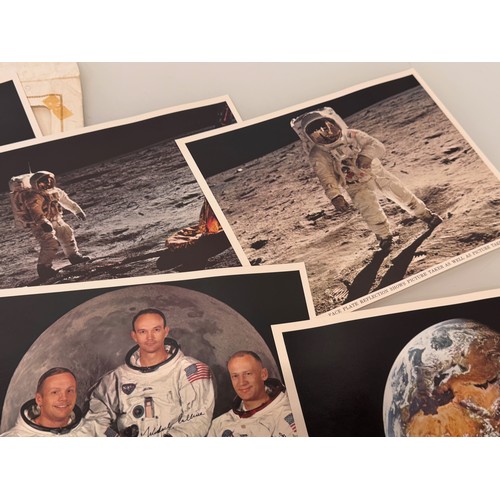 5 - Ephemera, Apollo 11 photo pack and a book on the mission.

This lot is available for in-house shippi... 