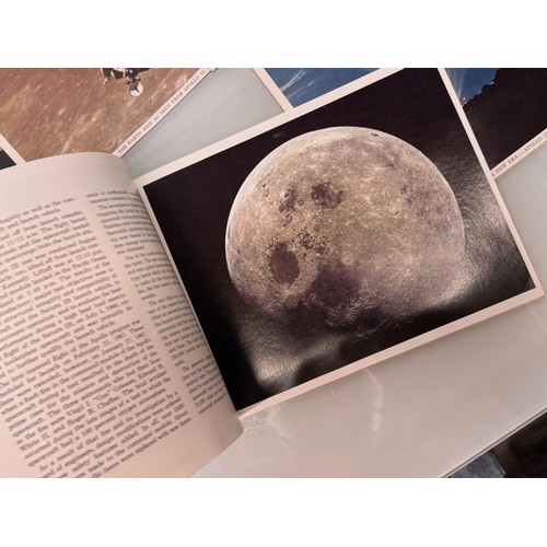 5 - Ephemera, Apollo 11 photo pack and a book on the mission.

This lot is available for in-house shippi... 