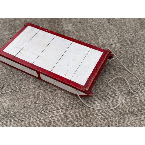 11 - Painted wooden sledge with metal runners.

This lot is available for in-house shipping