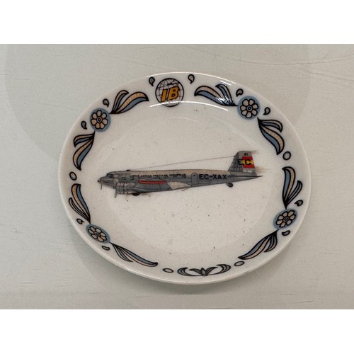 22 - Aviation themed pottery, a pin tray illustrated with a Dakota and a RAF mixing bowl.

This lot is av... 