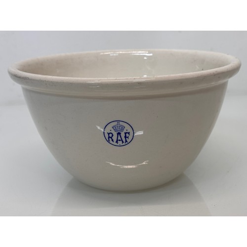 22 - Aviation themed pottery, a pin tray illustrated with a Dakota and a RAF mixing bowl.

This lot is av... 