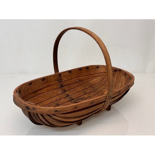 54 - A Gardener’s trug.

This lot is available for in-house shipping