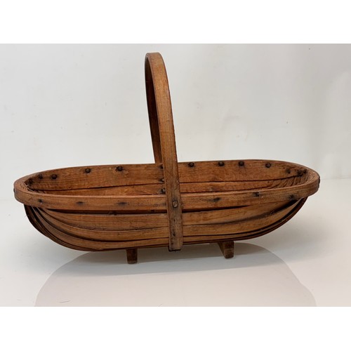 54 - A Gardener’s trug.

This lot is available for in-house shipping