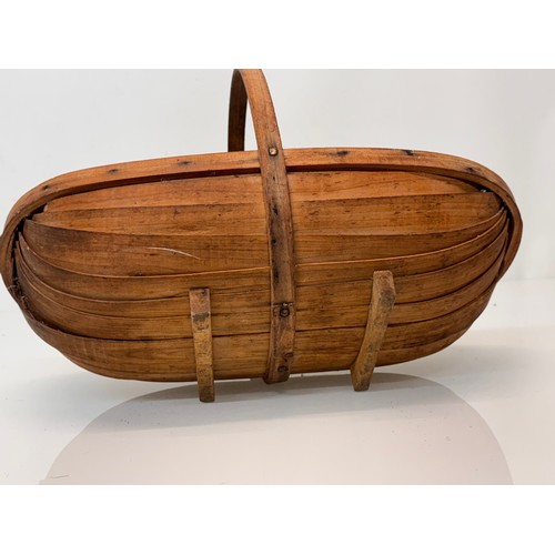 54 - A Gardener’s trug.

This lot is available for in-house shipping