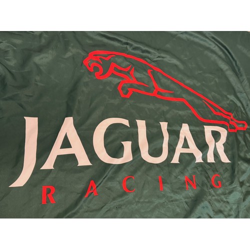 55 - Automobilia, motor racing flag for Jaguar racing cars, 130 cm x 95 cm.

This lot is available for in... 