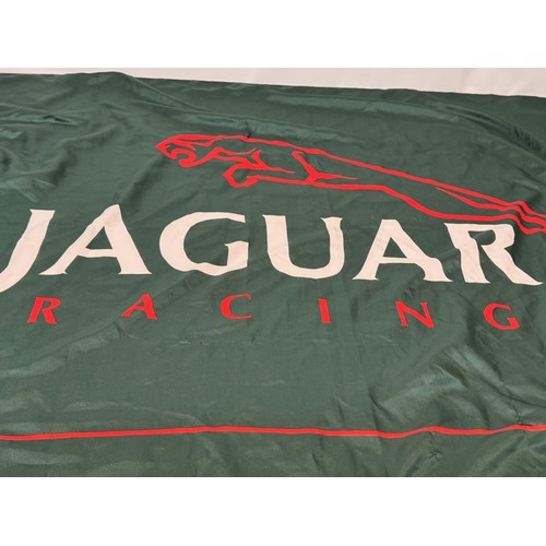 55 - Automobilia, motor racing flag for Jaguar racing cars, 130 cm x 95 cm.

This lot is available for in... 