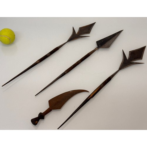 58 - Ethnic tribal spears and a knife.

This lot is available for in-house shipping