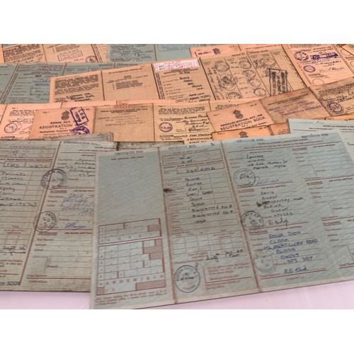 61 - Automobilia, a good quantity of vintage vehicle registration documents.

This lot is available for i... 