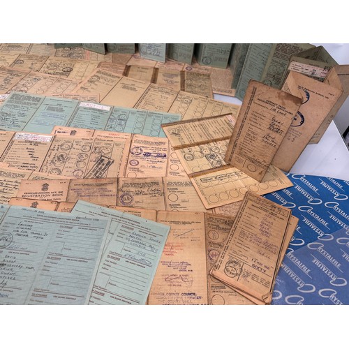 61 - Automobilia, a good quantity of vintage vehicle registration documents.

This lot is available for i... 