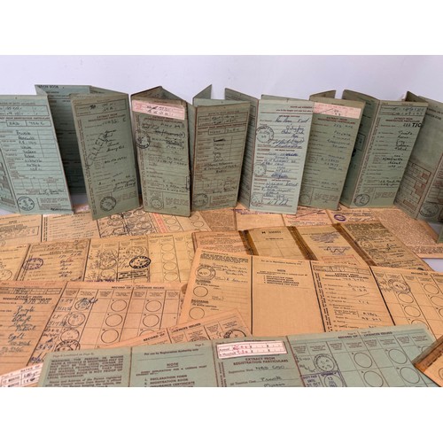 61 - Automobilia, a good quantity of vintage vehicle registration documents.

This lot is available for i... 