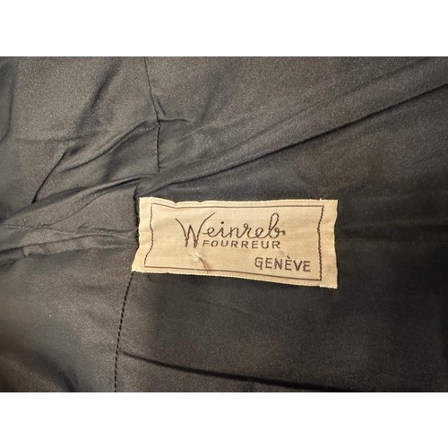 47 - Vintage fashion, a lady’s lambs wool coat marked for a Swiss Furrier.

This lot is available for in-... 