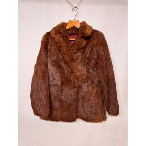 50 - Vintage fashion, a lady’s fur coat mid length mid century design.

This lot is available for in-hous... 