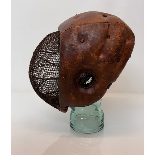 9 - C19th century fencing mask.

This lot is available for in-house shipping.