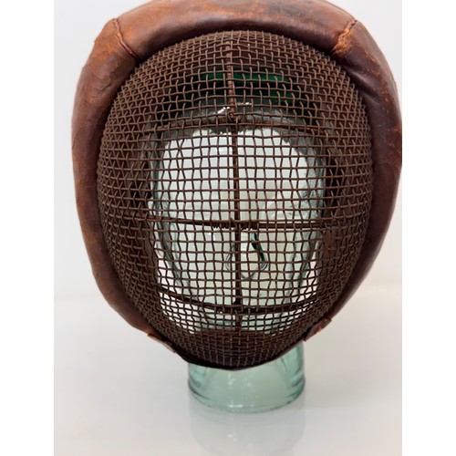 9 - C19th century fencing mask.

This lot is available for in-house shipping.