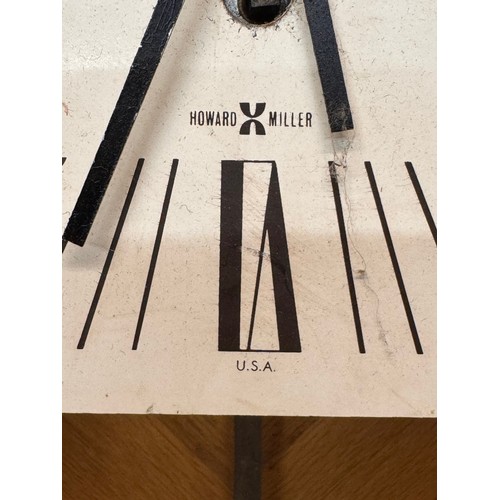 11 - Mid Century designer wall clock marked for Howard Miller USA. 85 cm tall.

This lot is available for... 